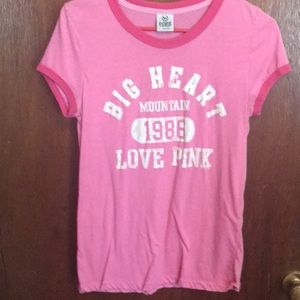 VS pink T-shirt.